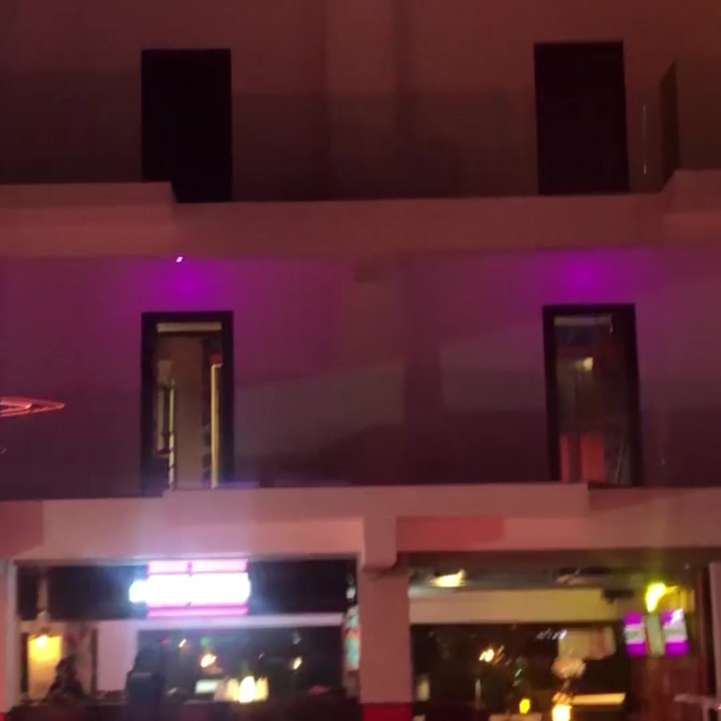 Socialtel Koh Samui illuminated facade and entrances at night