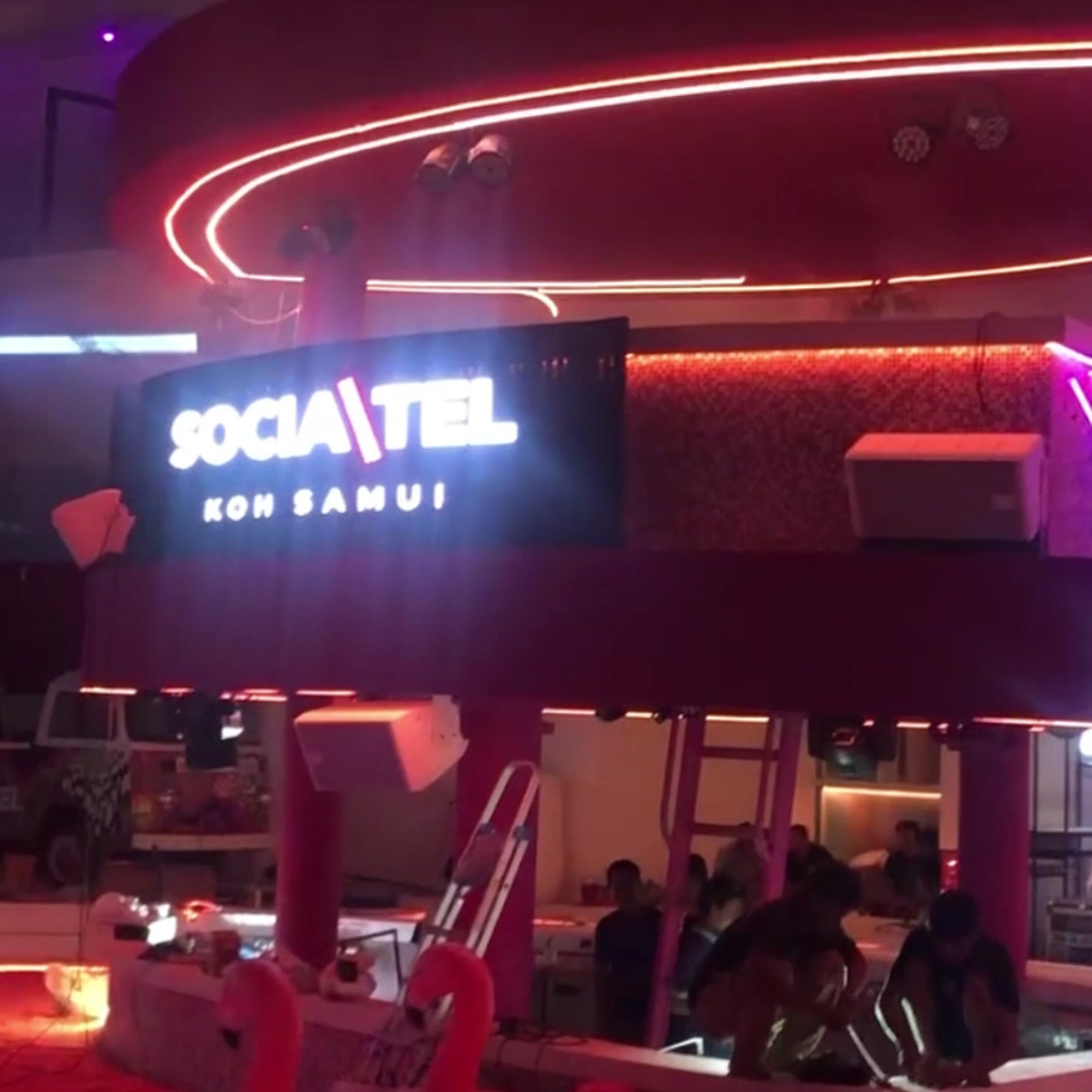 Socialtel Koh Samui illuminated brand sign at night