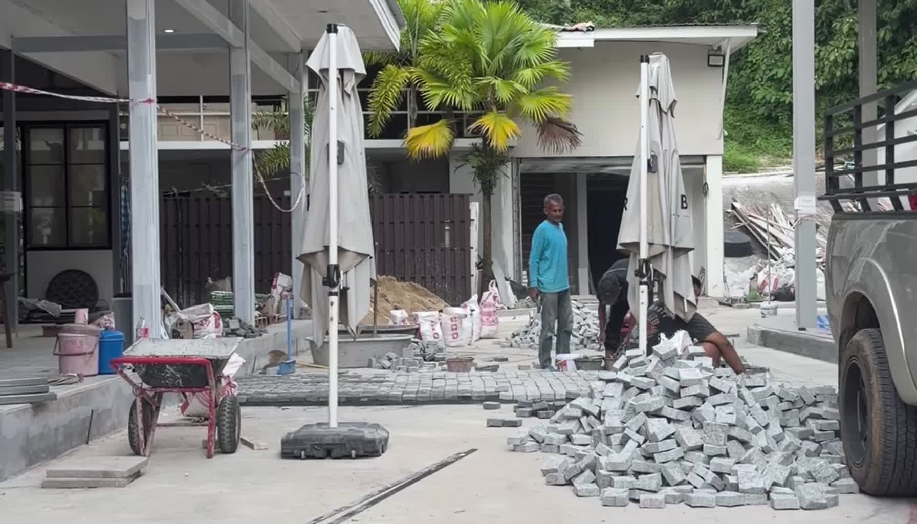 Paving Design for Pedestrian Lanes and Restaurant Terraces in Thailand: Slip Resistance, Monsoon Rain and Heat